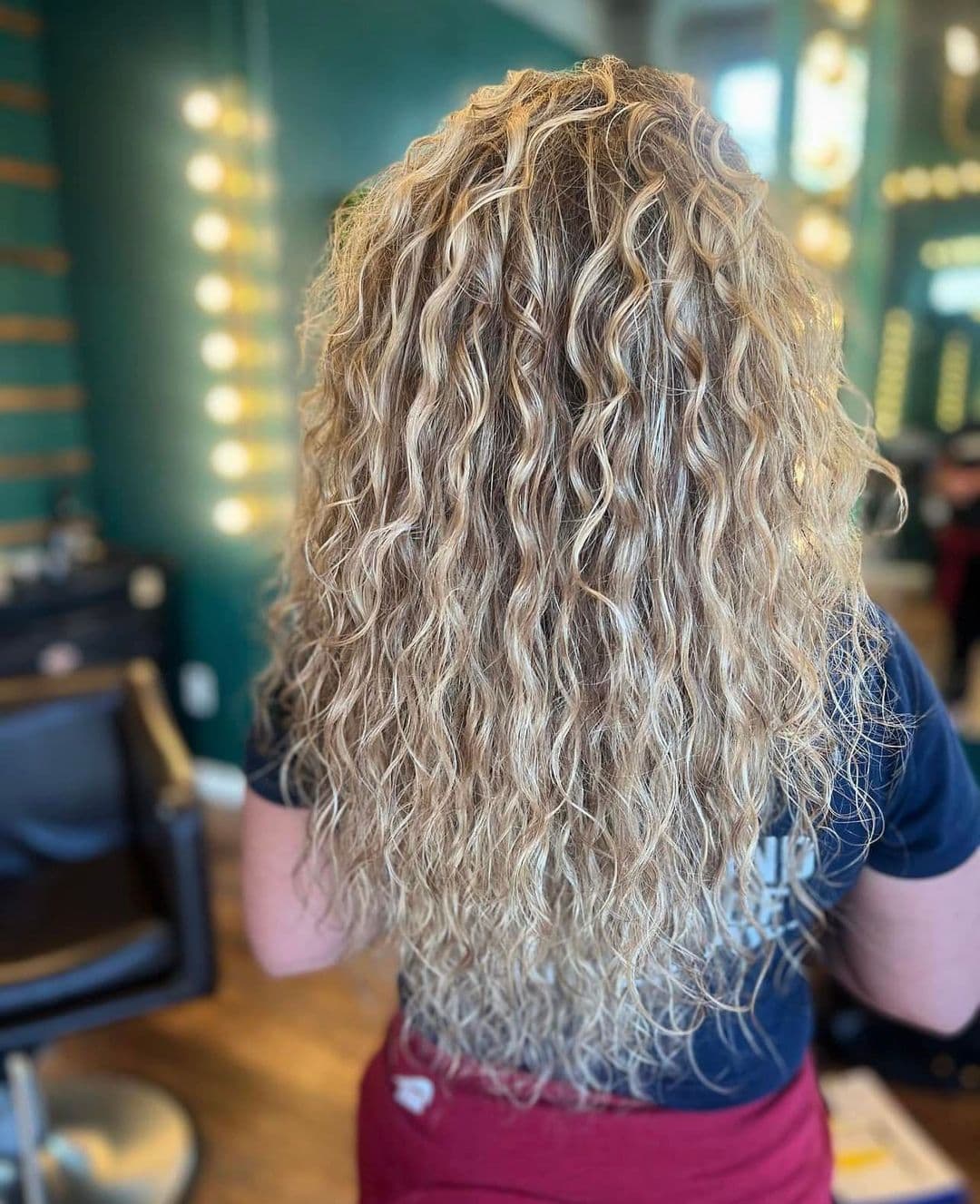 Defined curls finished at Hair Mafia Salon